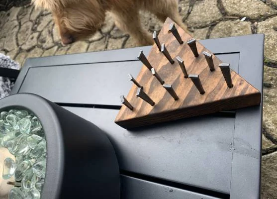 Original Triangle Peg Game photographed outdoors